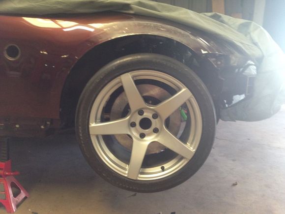 18x11 +13 with a 315/30ZR18 at Full droop, unsure of exact camber at the moment