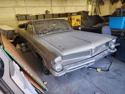 Pair of 63 Bonneville's One Convertible