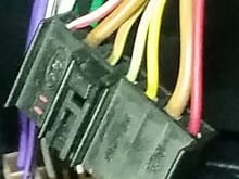 Hoping you can help me id the wires on this sapphire 4x4 stereo plug. Starting from the left (ford logo side) if you can please.

Also the 3rd wire in from the left (brown with yellow trace) is missing from the splitter loom to the radio & cd player....is that possibly causing my issues??
