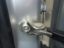 Door check strap bolt change to stainless steel bolts