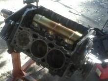 Junkyard motor torn down in progress.