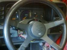 MY MATE FOUND THIS STEERING WHEEL HANGING UP
IN A BREAKERS YARD WALL....LIKE NEW