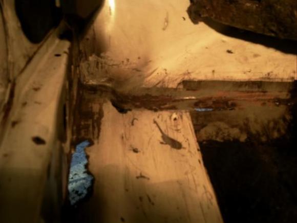 Holes in floor where water was getting in as she had no battery rack totaly rotted away