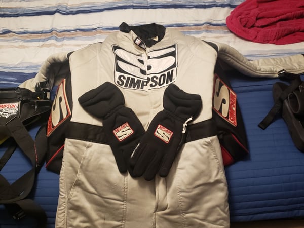 Simpson 20 suit,helmet,gloves,head and neck restraint ect.