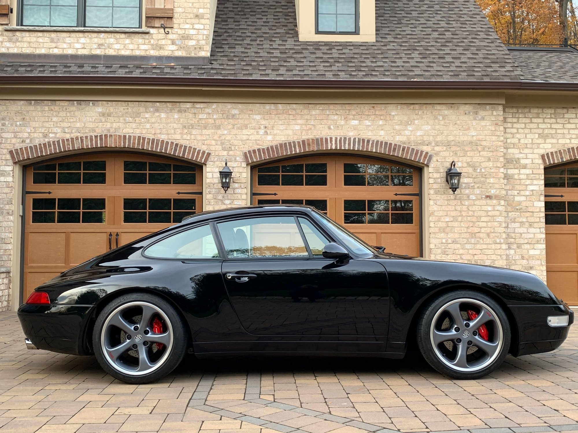 I have had this 993 for many years now. Just over 15K miles ! With Techart wheels on it. 