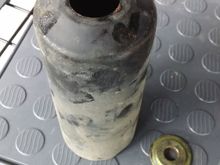 Here is the rear plastic boot I am comparing the front one to and you will notice what looks like two washer stuck together but I think that is the way they were done, not sure where that goes !