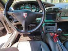 Installed. Nope the German flag theme I've got going on. Not seen are black with red and yellow stitched seat belt clip wraps and a German flag wrap on the rear view mirror. Oh and matching armrest cover and handbrake cover. So childish and indulgent I know. 