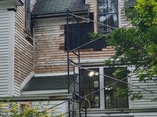 Here you can see the rot and the basement exit, roof and door on the left. That prevents getting staging to access that highest peak.  