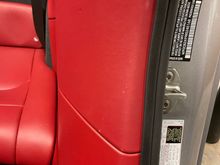 These are the small nicks caused by the nonchalant release of the seatbelt.