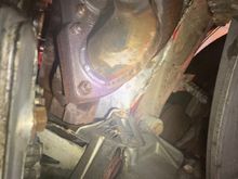 This is just more of the manifold flange. Any darker or shinier spots are oil marks