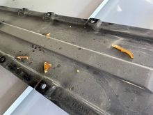 Debris from grommet
