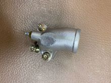 944T water outlet, both pieces including correct low profile 6mm bolts. Bleed screw replaced with brake caliper bleeder—much less messy when you can connect a hose to collect the coolant!  
951 104 315 00/313 00. New, as shown, $65