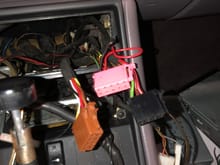 Pinkish cable is the one that controls the amp in rear speakers