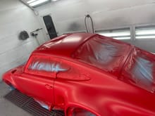 2 stage paint . Guards red and 2 coats of clear better than factory 