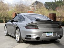 Cut outs in OEM heat shielding are so the valves moving are visible through the RUF bumper airflow cutouts