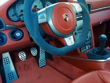 My 997s with terracotta.... rennline pedal kit, DC customs steering wheel, alcantara shifter and alcantara center console, carbon fiber trim bezels .....