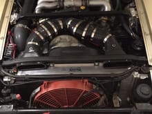 The asymmetry of the intake is due to the off-center SC intake due to its internal belt drive. 