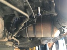 This is my catalytic converter. I assume it is stock? 3 of the 4 nuts are accessible without a lot of creativity. The one at about the 2pm position will be a challenge unless i take off more parts.