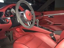 Carrera red interior with Alcantara sport design steering wheel, shift lever and crested console lid