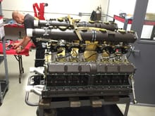 porsche 917k engine!.. with it's original mechanic.. he now works here at Canepa and is finishing rebuilding this thing.