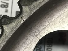 One of the two cracks in a cam pulley