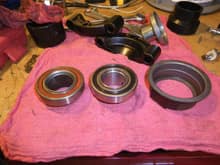 Dissembled throw out bearing.  New bearing to left of body with black