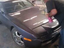944 just got painted, it was still in the booth and the guy is wiping dust particles off it