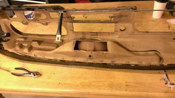 After seeing the duct work for the defroster vents, I decided to remove it and delete the speaker cavity and open up the air flow.