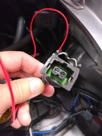 If your car is a MT, this unused connector resides in the back rear corner of the engine bay and one of the two contacts can supply switched 12v power for the warning defeat harness