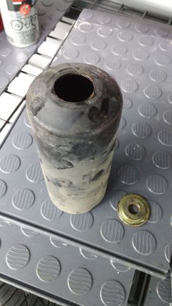 Here is the rear plastic boot I am comparing the front one to and you will notice what looks like two washer stuck together but I think that is the way they were done, not sure where that goes !