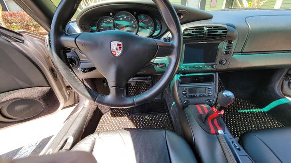 Installed. Nope the German flag theme I've got going on. Not seen are black with red and yellow stitched seat belt clip wraps and a German flag wrap on the rear view mirror. Oh and matching armrest cover and handbrake cover. So childish and indulgent I know. 