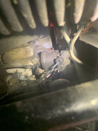 Here is the “oil cassette” as I have heard it called. It’s the thing with the oil filter and the oil pressure sender in it. When I tell you that sender is caked in oil I mean it is CAKED in oil. 