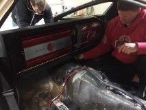 Routing the wiring harness through a channel dug out in over the tranny / torque tube tunnel.