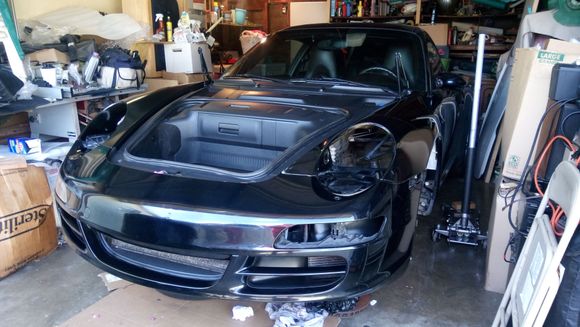 Bumper fitted on the car finally. I do have problems with the left and right orange side lights staying on. Am I missing some clips?