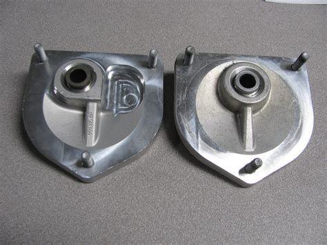 Not my photo. Camber plates are still in box. 