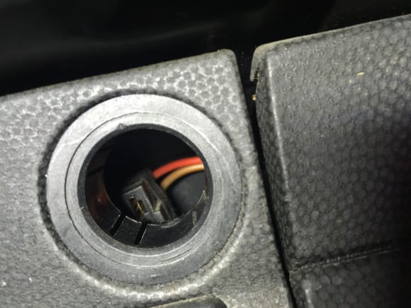 There's the plug teasing behind the dash