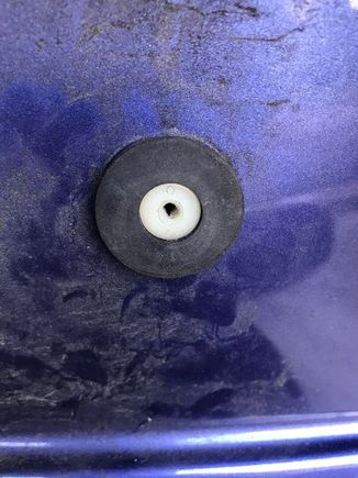 The washer with the larger hole goes on first