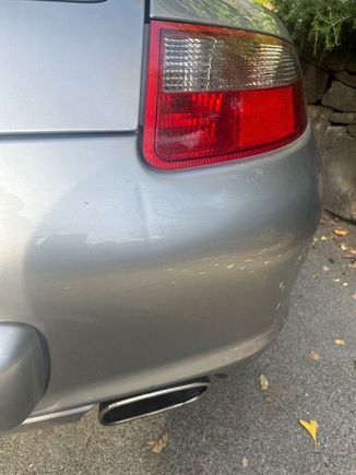 Note: Blemish on right rear bumper cover