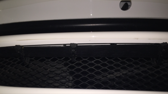 Shown from underneath the bumper cover middle support