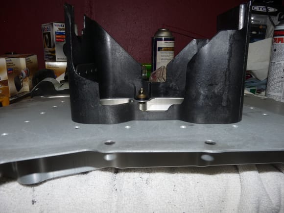 Baffle with tabs removed on windage tray
