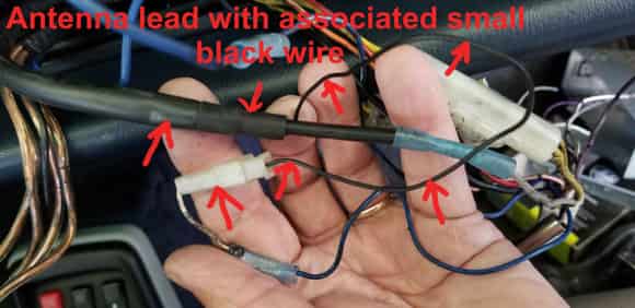 This is the small wire that is wrapped together with the antenna lead -- it was connected to the "auto-antenna" lead on the prior Clarion stereo head.
