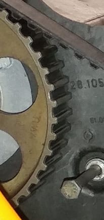 Worn aluminum gear from donor motor.  I didn't even know they made aluminum versions of the square tooth gears.