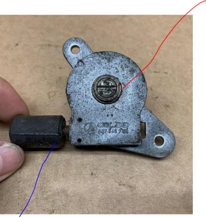 Do i unscrew the red arrow nut? 
What do i do with the blue arrow piece?