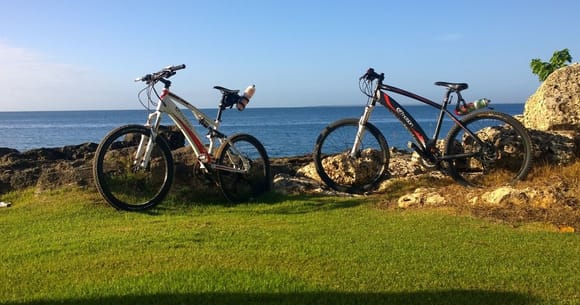 His & Her e-bikes... battery is in the downtube, motor is in the rear hub, hydraulic disc brakes.