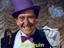 Burgess Meredith as the penguin