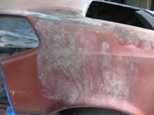 Someone who owned this car had a enemy at one time like the greedy chicken. The way this is etched in the metal and shows as if it was running down leaves me to believe someone poured acid on this qtr panel. I hope they got it on them self.