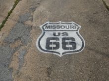 Painted right on the roadway before a bridge that no longer exists