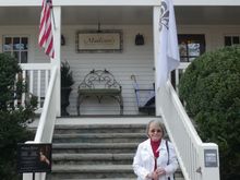 My wife in front of the pricey Madison's restaurant. $106 bill with no alcohol.