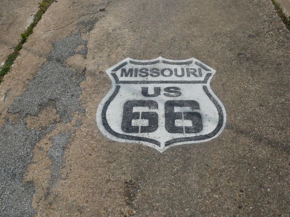 Painted right on the roadway before a bridge that no longer exists