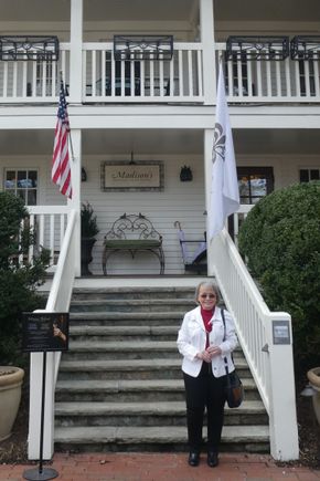 My wife in front of the pricey Madison's restaurant. $106 bill with no alcohol.